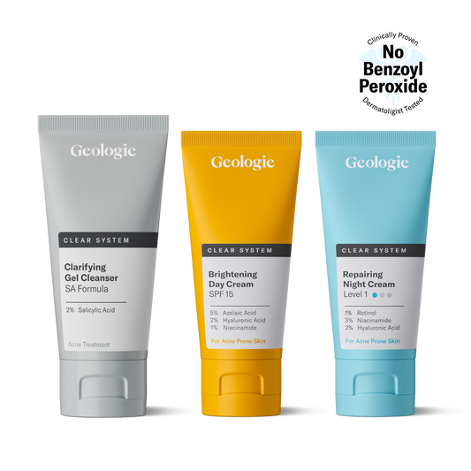 Three tubes of Geologie's Clear System skincare products, including a clarifying salicylic acid formula, a brightening SPF 15 day cream, and a repairing night cream with retinol, clinically proven to clear acne.